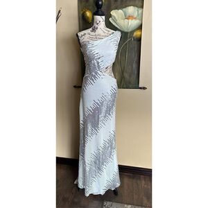 Clarisse boutiqe, white beaded ,Head turning gown, retails over $300